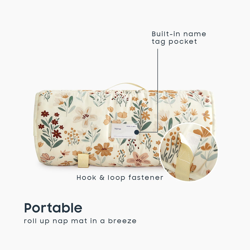 Wake In Cloud nap mat rollup with handle for convenient daycare transport.