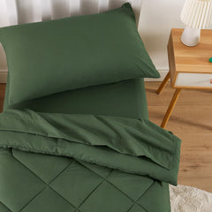 Wake In Cloud olive-green fitted sheet shows secure 8-inch pocket fit