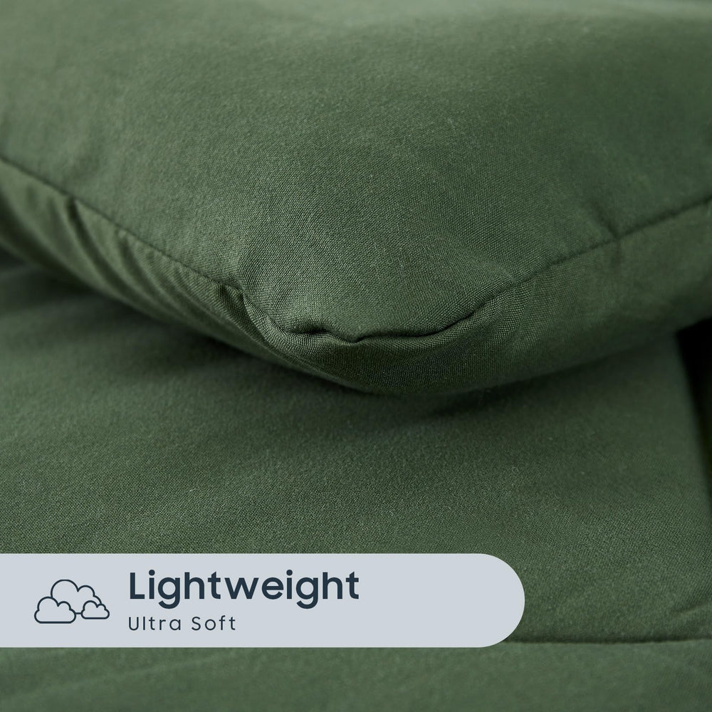 Wake In Cloud olive-green room scene conveys calm, kid-friendly vibe