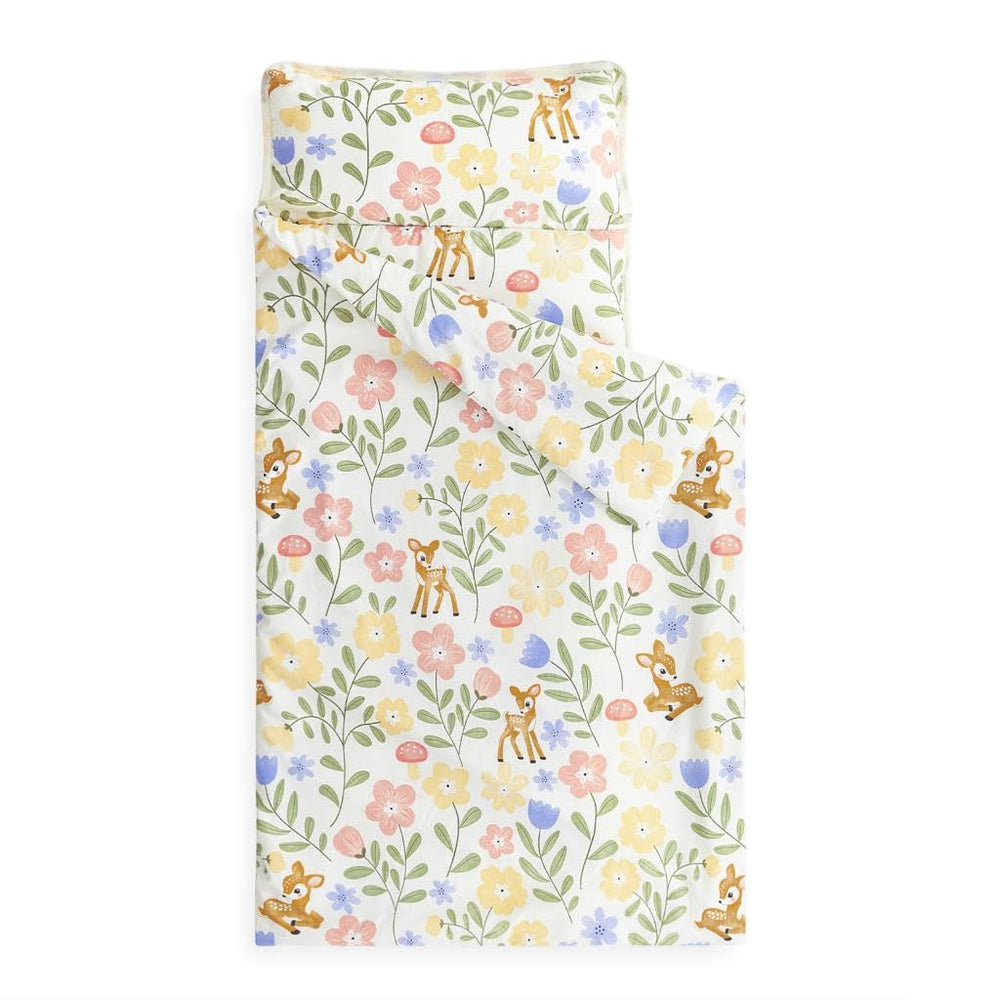 Wake In Cloud nap mat with floral design ready for nap time
