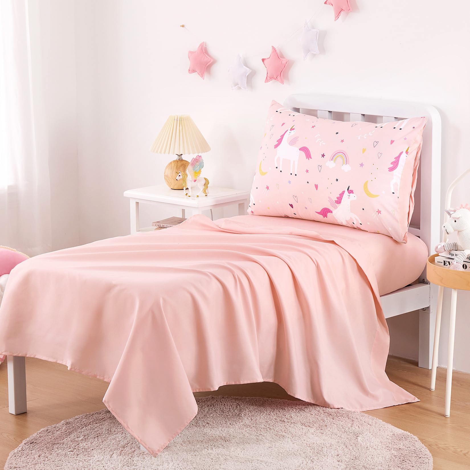 Wake In Cloud unicorn pillowcase pink coordinates with the set for cozy pillow support.