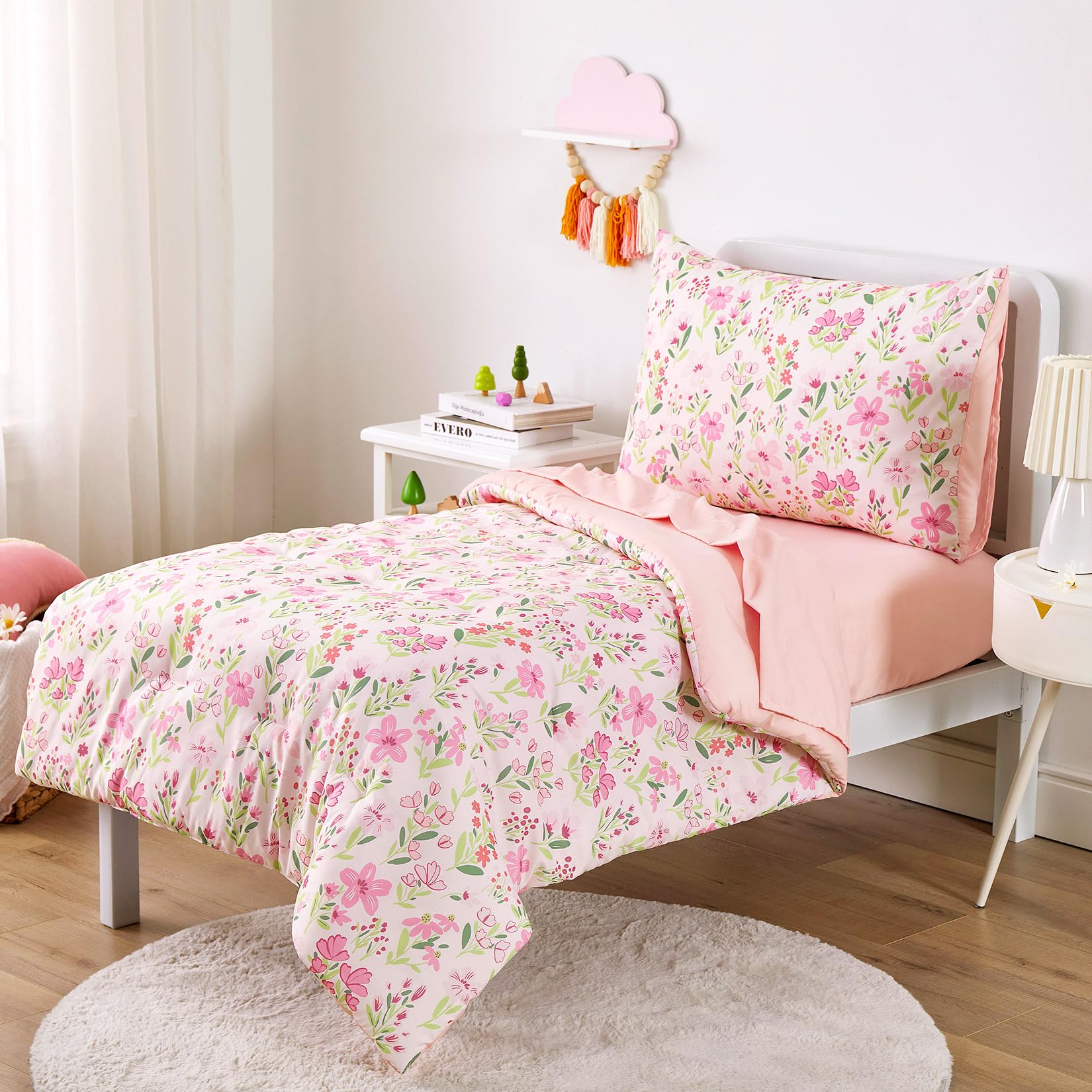 Wake In Cloud floral toddler bedding flat sheet close-up shows vibrant prints for cheerful mornings.