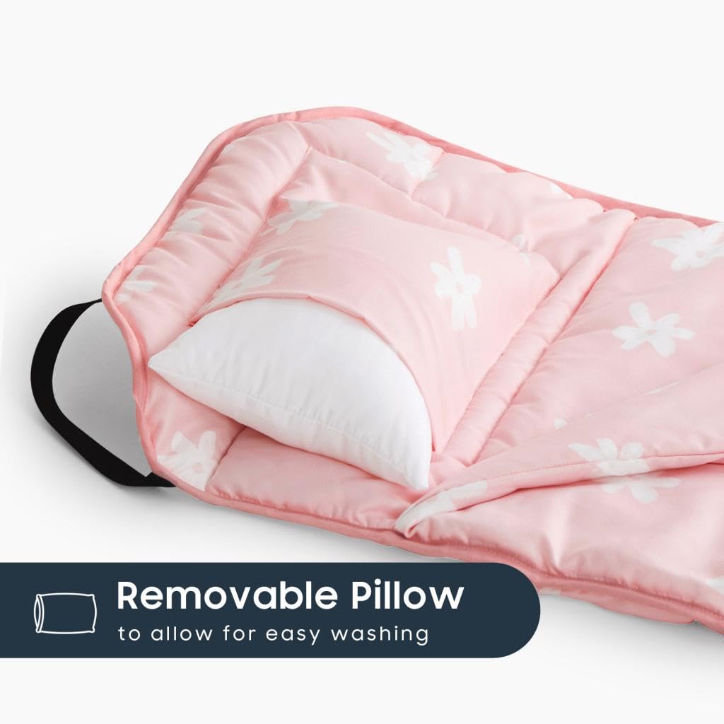 Wake In Cloud nap mat rolled with hook-and-loop fastener for compact storage.