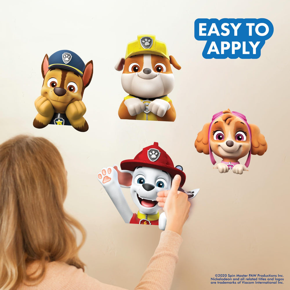 WALL PALZ Paw Patrol Rubble face decal brightens playroom walls with bold yellow tones.