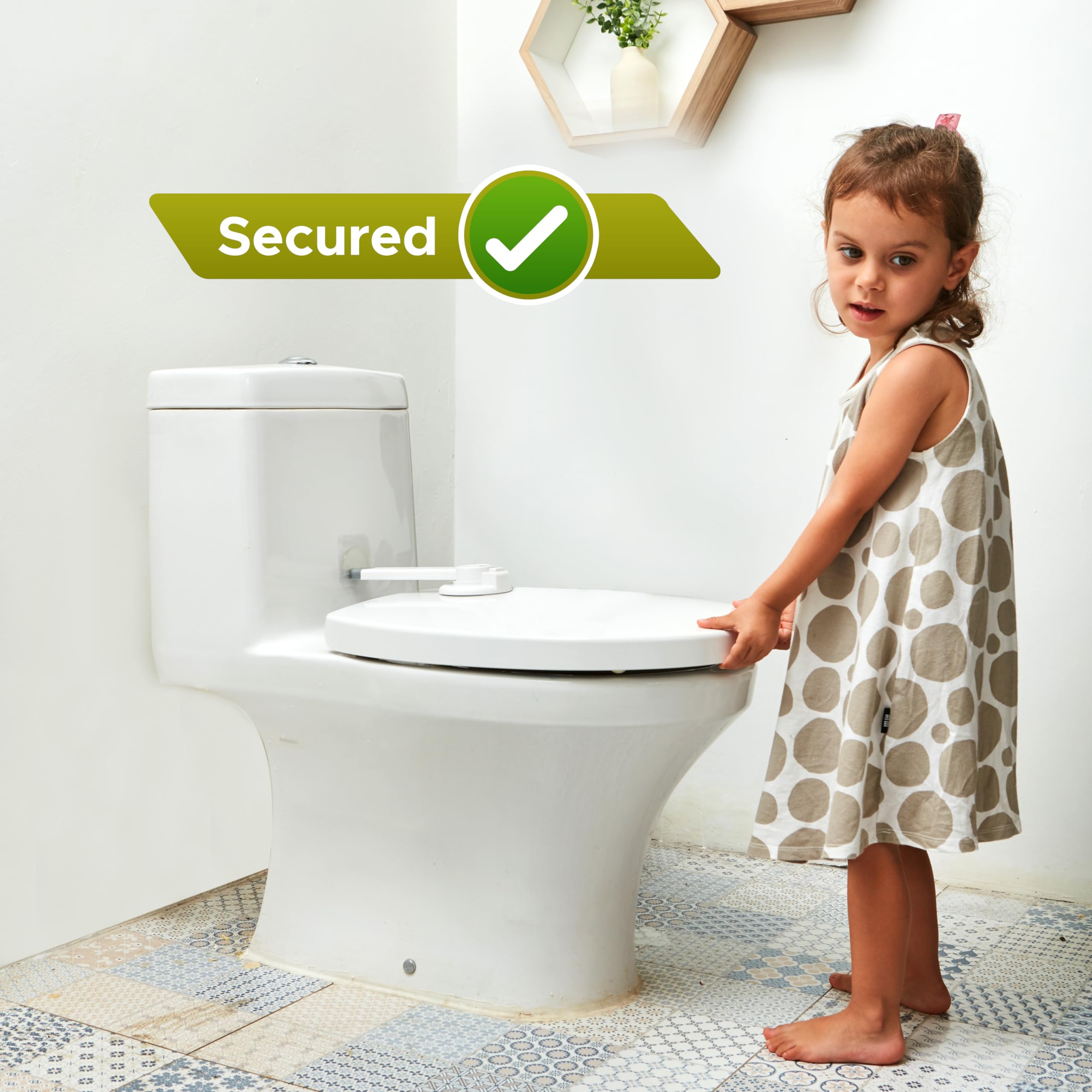 Wappa Baby Toilet Lock with 3M adhesive shows strong backing for lasting grip.