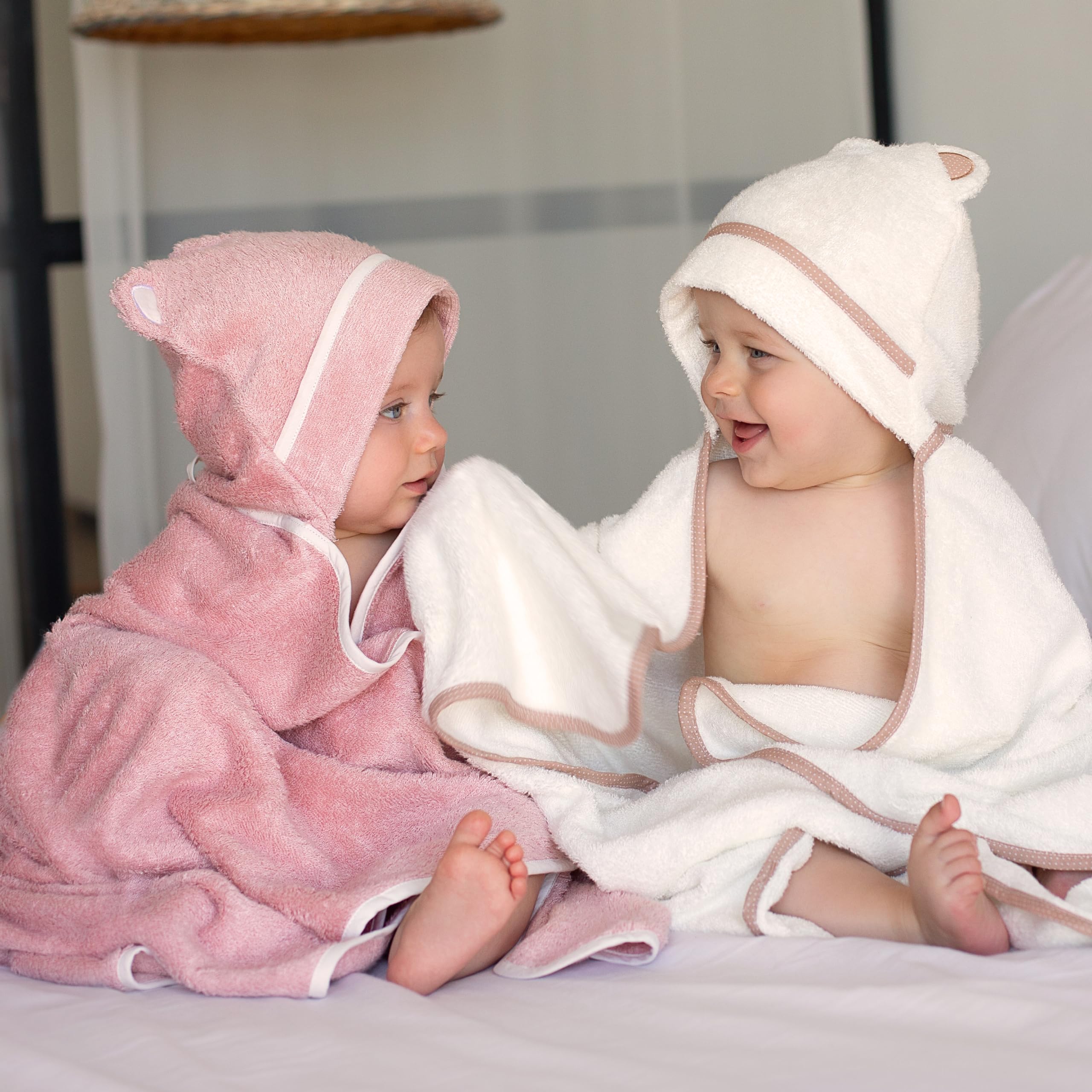 Warm Cuddles hooded towel baby head cover keeps little ones warm and secure