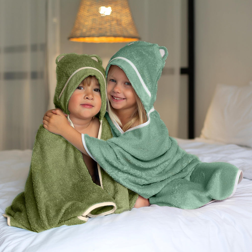 Warm Cuddles hooded towel laid flat at 42x30 inches for growing toddlers