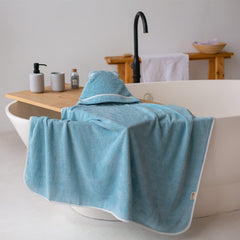 Warm Cuddles towel folded blue presents easy storage and mess-free after-bath use.