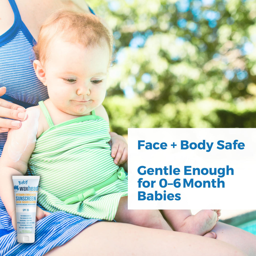 Waxhead sunscreen tear-free application on baby's cheek