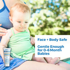 Waxhead sunscreen tear-free application on baby's cheek