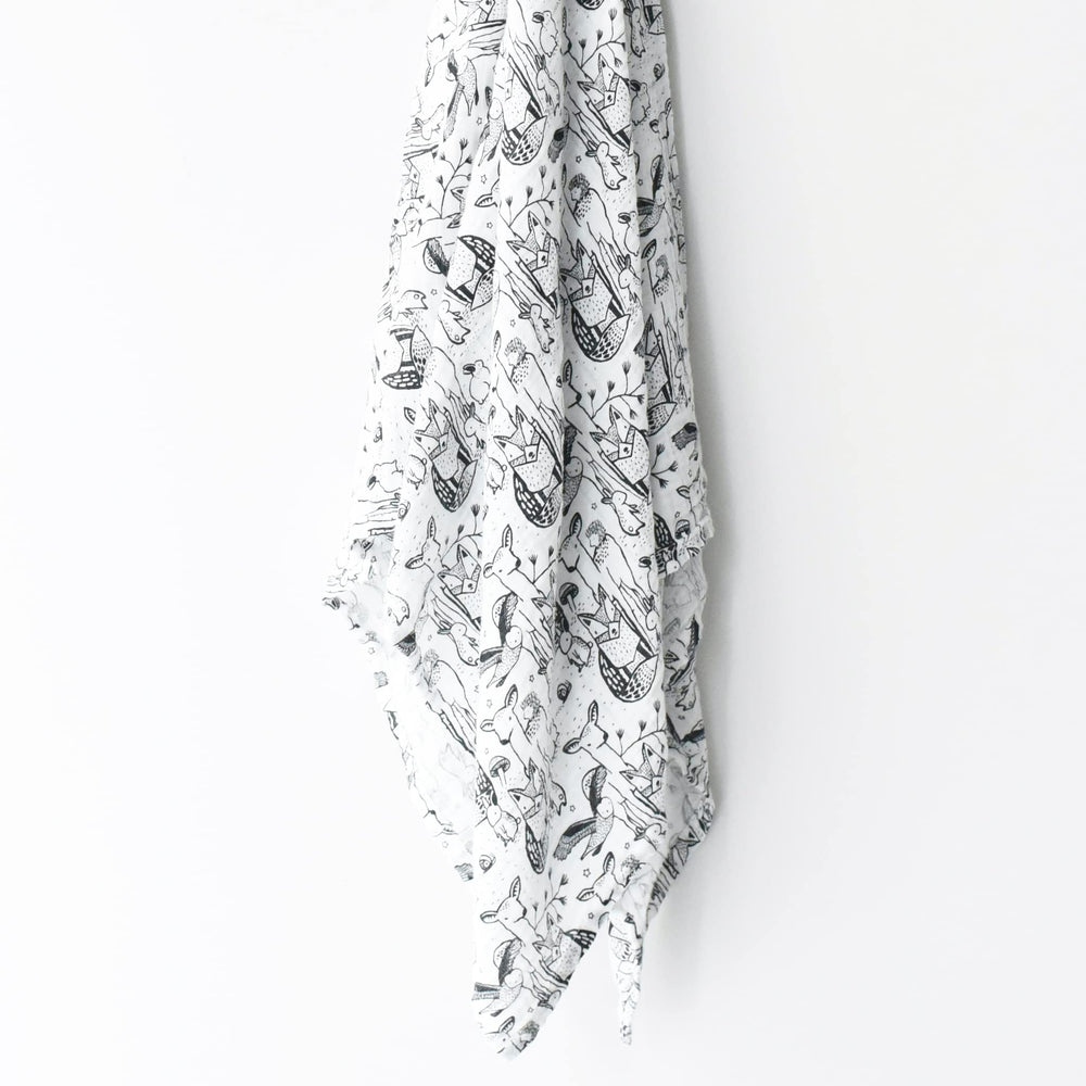 Wee Gallery forest animals swaddle packaging is gift-ready for new parents.