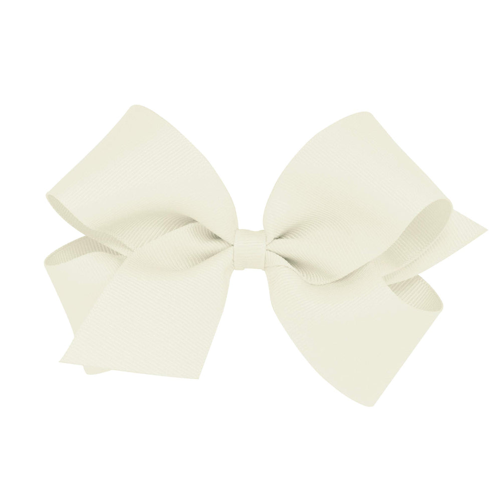 Wee Ones antique white bow close-up showing durable grosgrain and secure WeeStay clip.