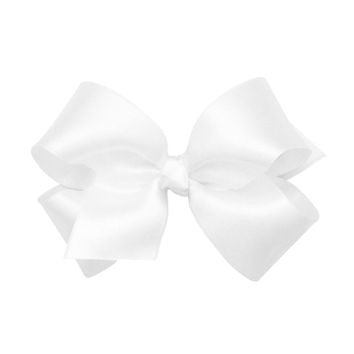 Wee Ones bow with white clip secured for all-day wear on a child