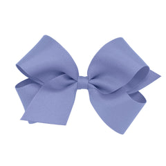 Wee Ones blue bird bow on WeeStay clip for secure all-day hold.