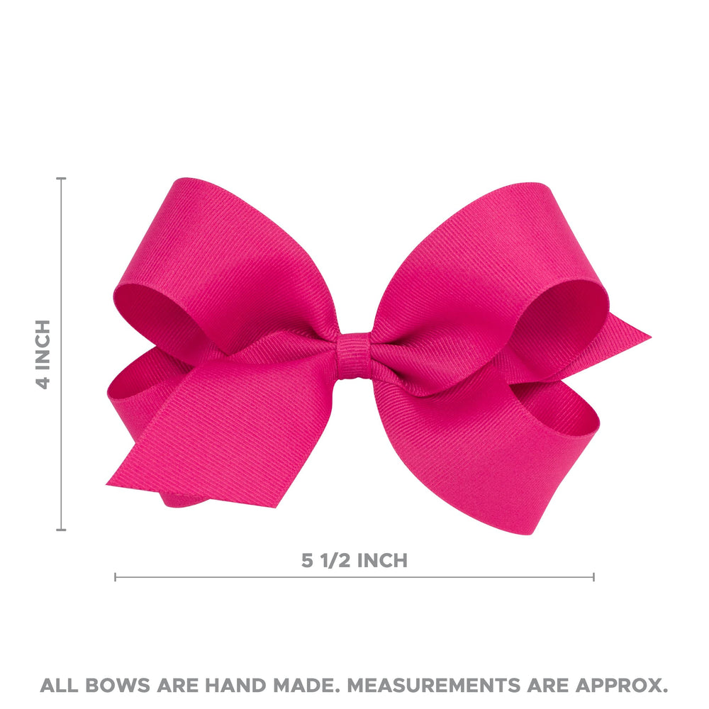 Wee Ones bow shown with matching-pigtails for coordinated outfits.
