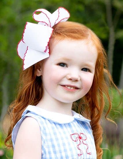Wee Ones bow on head showcases versatile styling for photos and outfits