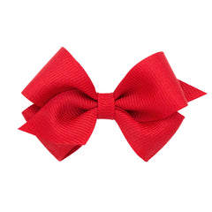 Wee Ones red bow closeup highlighting durable grosgrain for everyday wear.