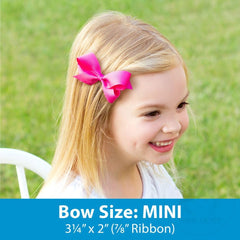Wee Ones mini white bows worn on a child’s head for everyday outfits