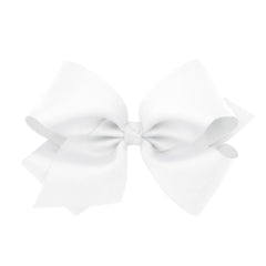 Wee Ones classic French satin bow in King white on a WeeStay clip for secure all-day wear.