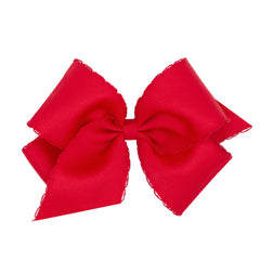 Wee Ones classic grosgrain Moonstitch bow on WeeStay clip, front view for secure daily wear.