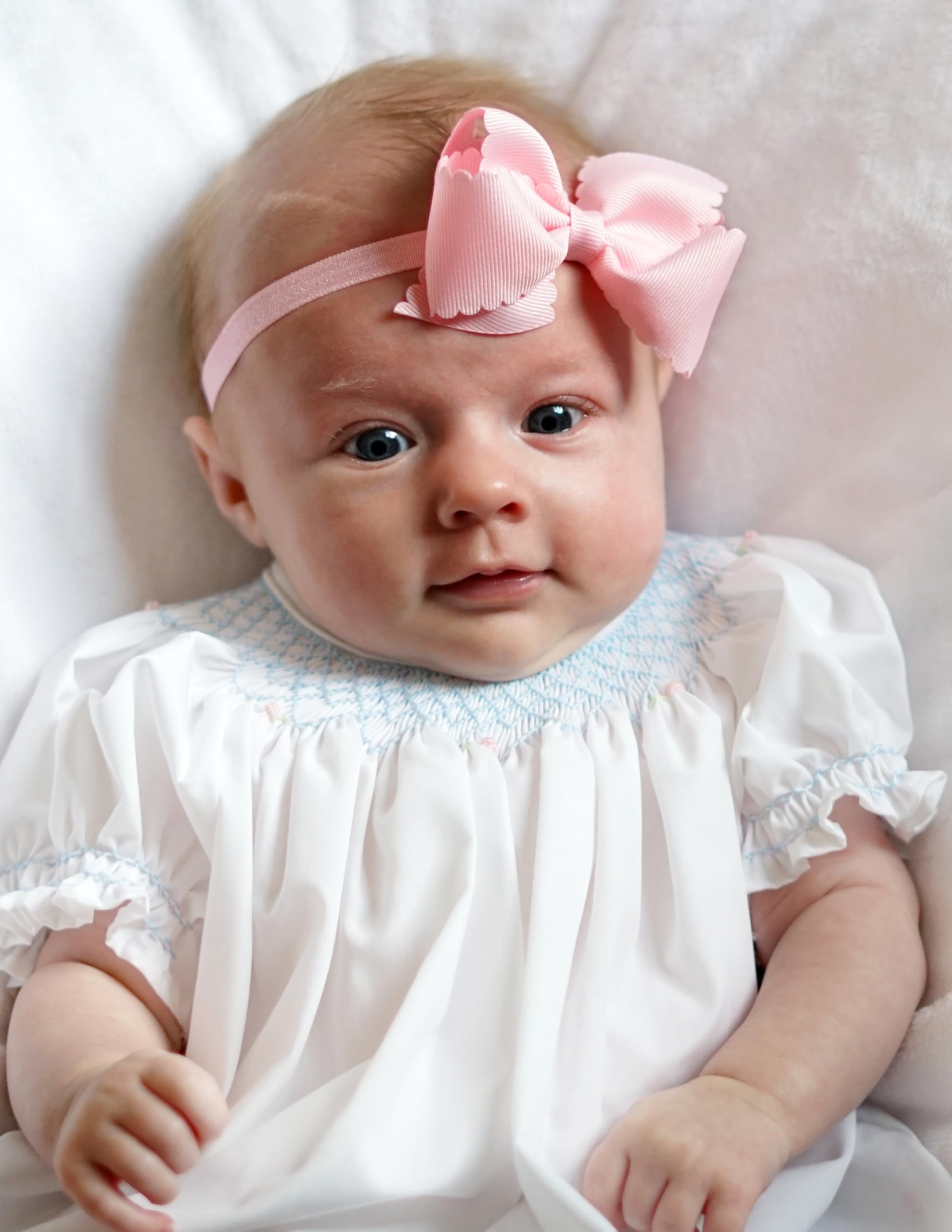 Wee Ones white bow helps keep hair tidy for joyful family moments