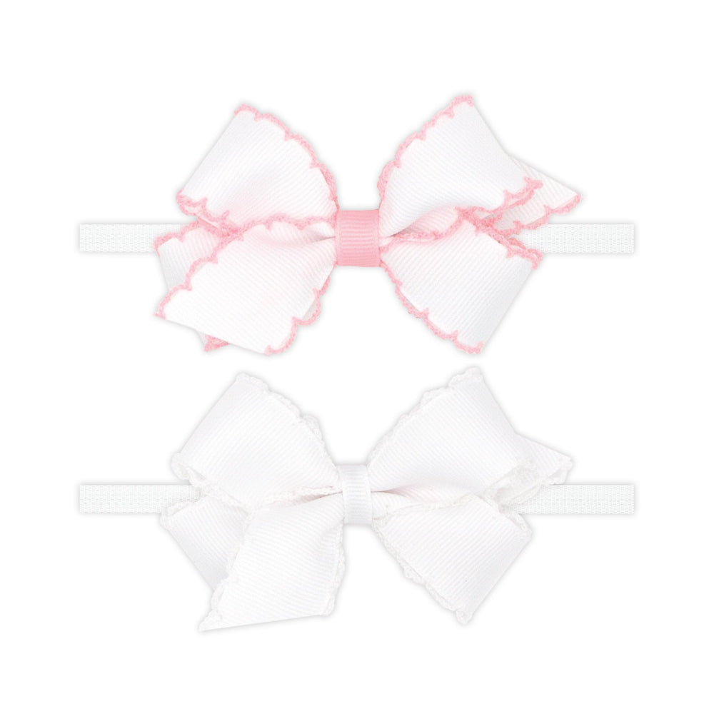 Wee Ones two mini Moonstitch bows on a skinny nylon band in light pink for versatile daily wear.