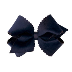 Wee Ones navy grosgrain bow with scalloped velvet overlay for chic school-day outfits.