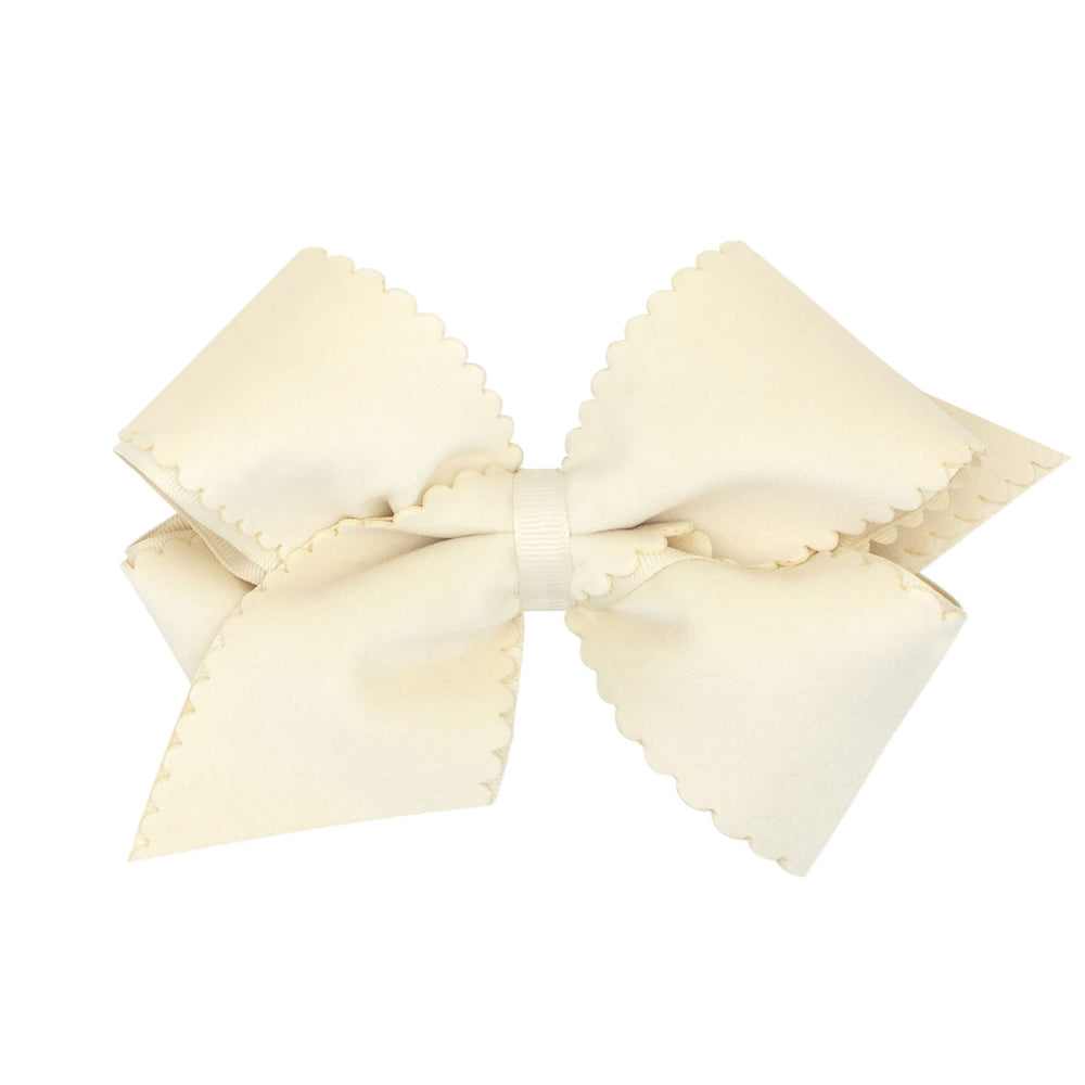 Wee Ones antique white bow with scalloped velvet for versatile everyday wear.
