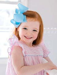 Wee Ones grosgrain texture bow emphasizes durable fabric with bright hot pink stitching