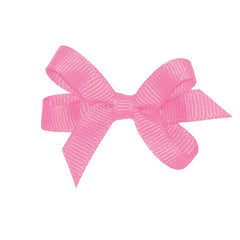 Wee Ones hot pink grosgrain bow on WeeStay clip stays put through playtime