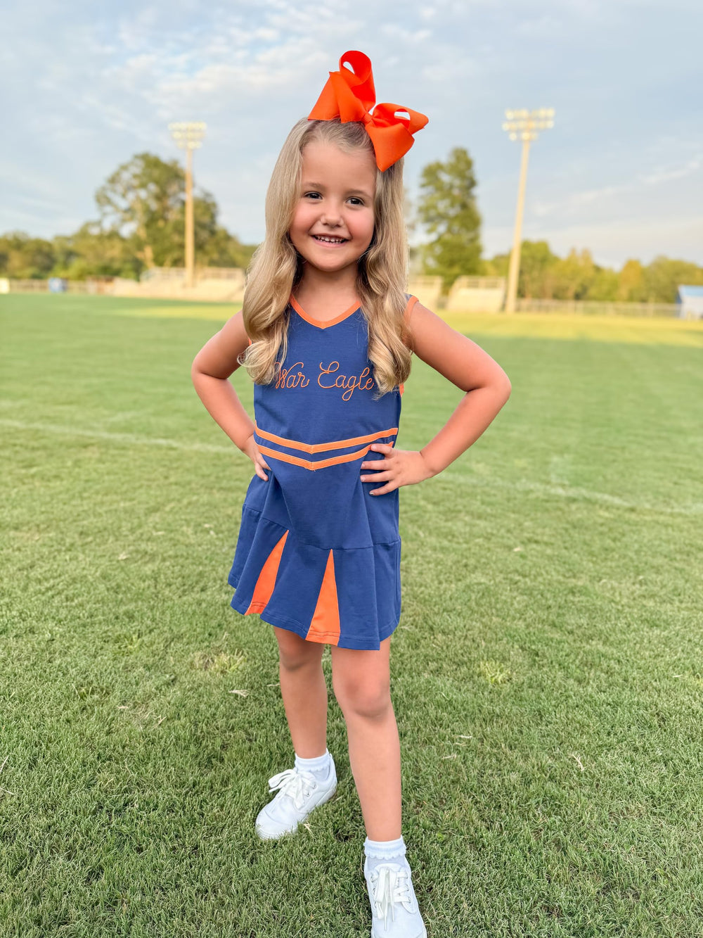Wee Ones kids orange bow clip for easy daily outfits.