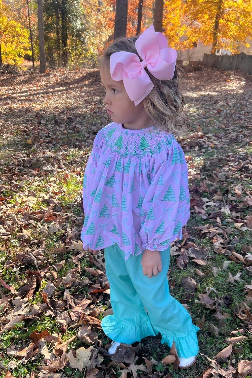Two Wee Ones bows in pink for matching pigtails and coordinated looks.