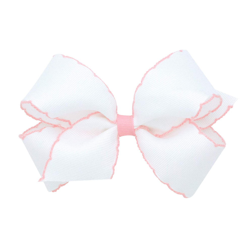 Wee Ones moonstitch edge bow on WeeStay clip secures all-day wear.
