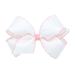 Wee Ones moonstitch edge bow on WeeStay clip secures all-day wear.