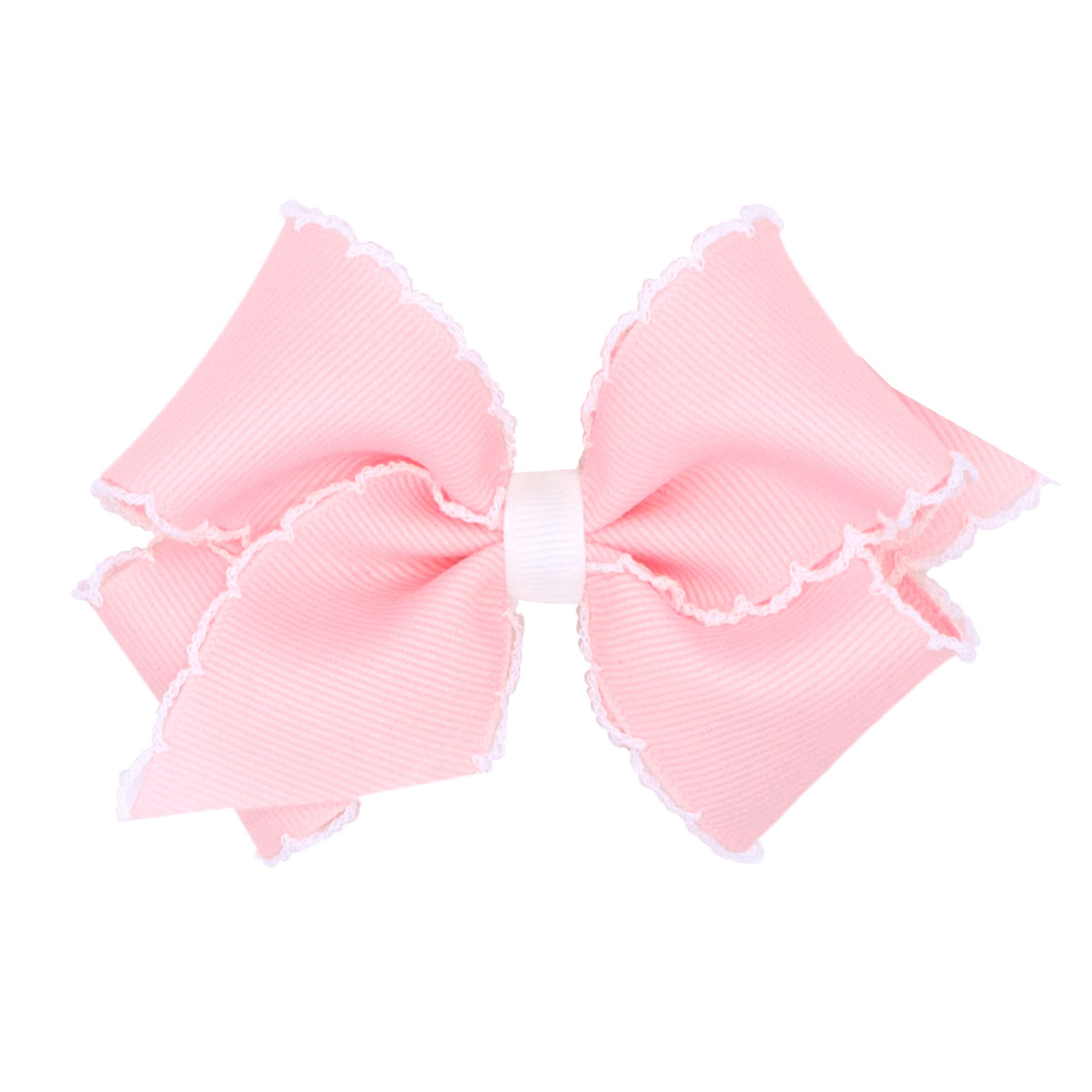 Wee Ones Moonstitch edge bow on WeeStay clip closeup, secure hold for active girls