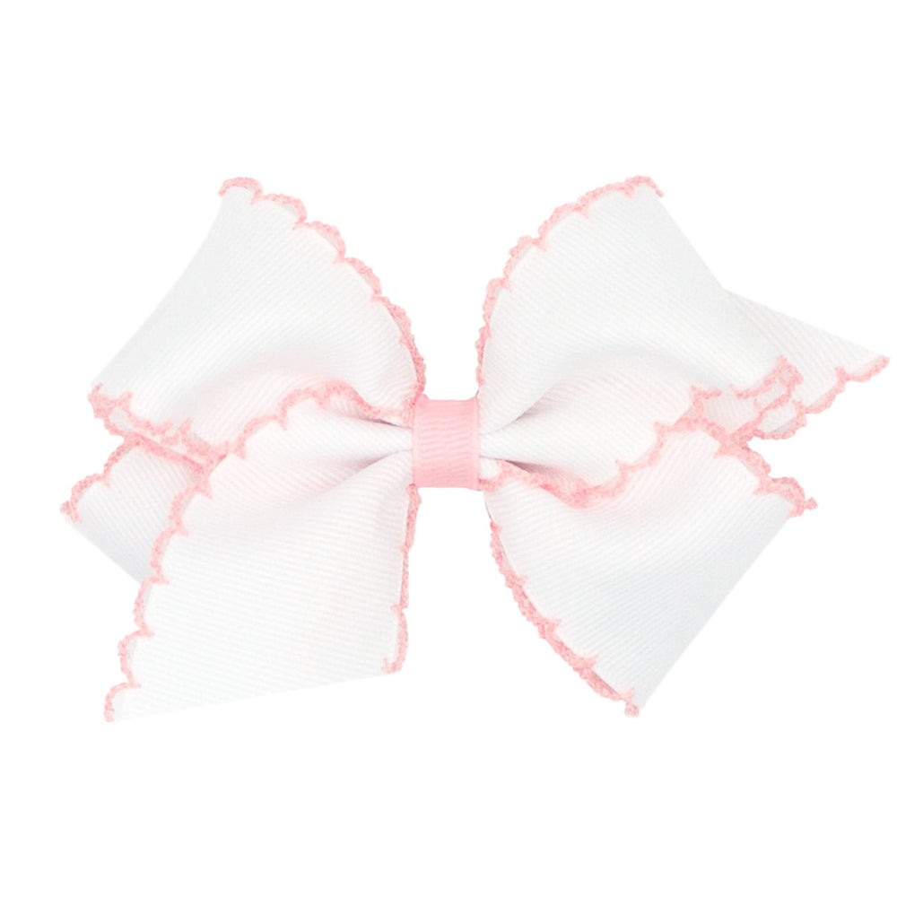 Wee Ones moonstitch bow on WeeStay clip, white with light pink edge adds everyday charm.