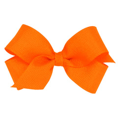 Wee Ones plain wrap grosgrain bow orange on WeeStay clip adds everyday charm and secure fit.