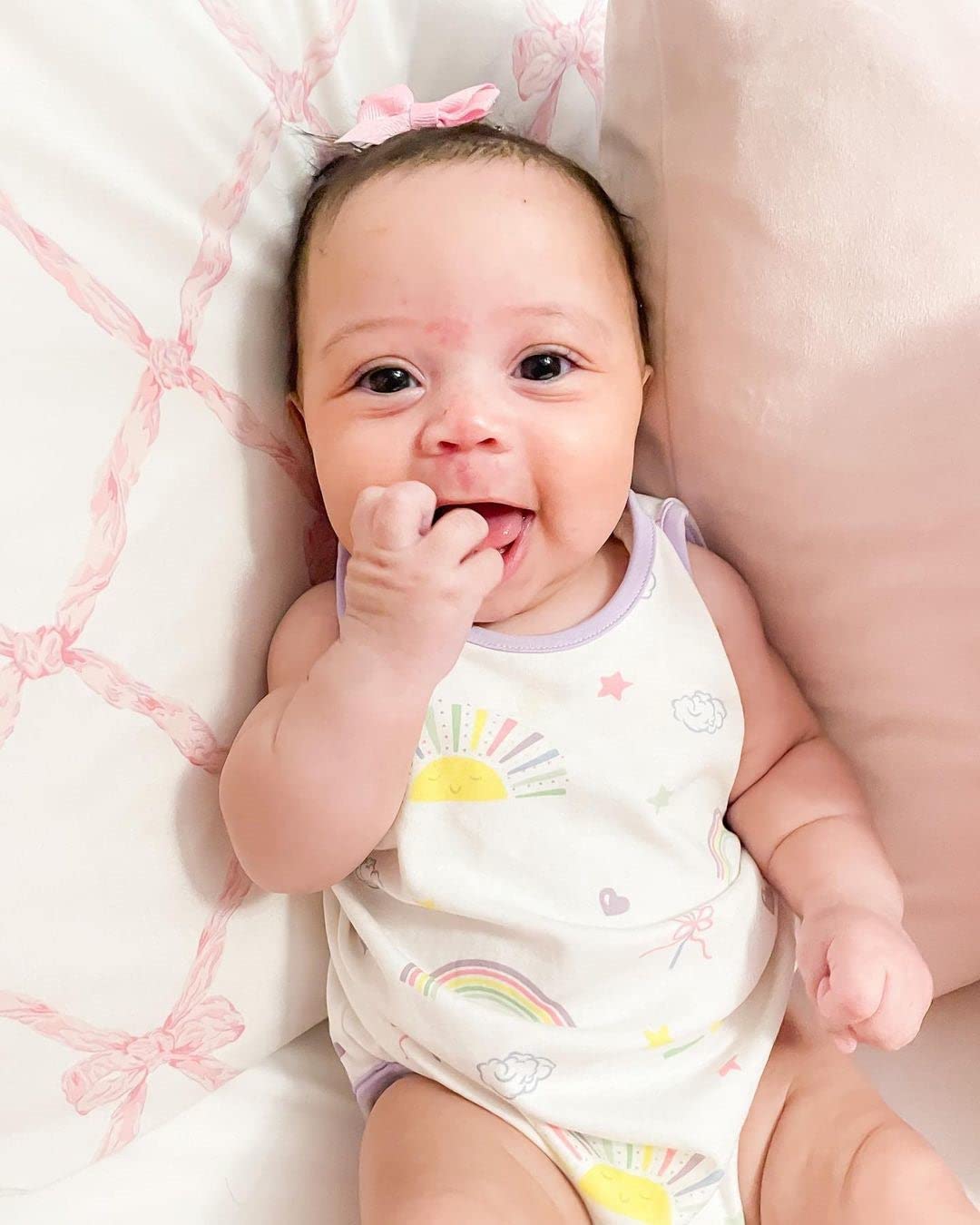 Wee Ones tiny antique-white bow adds delicate detail to outfits.