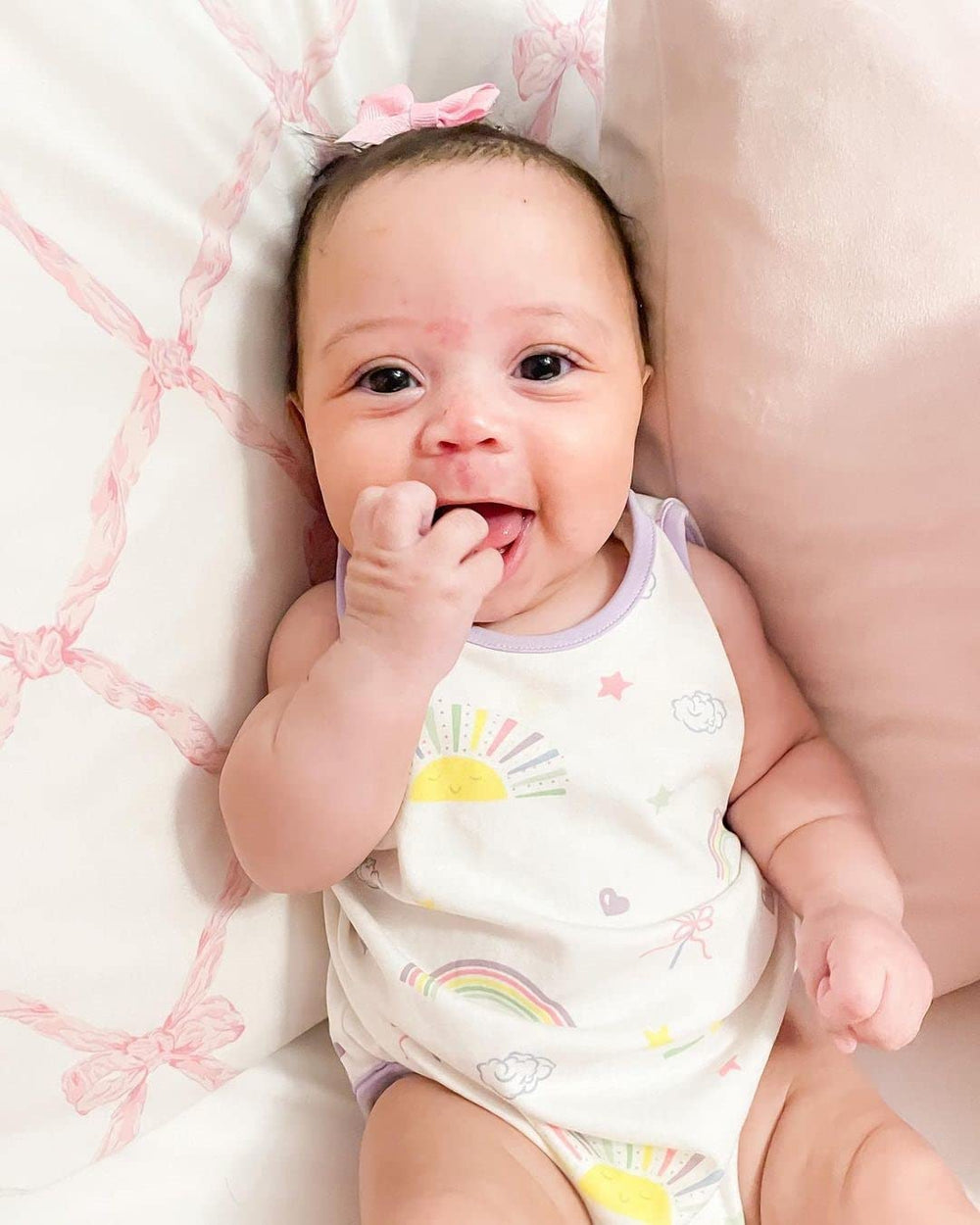 Wee Ones tiny antique-white bow adds delicate detail to outfits.