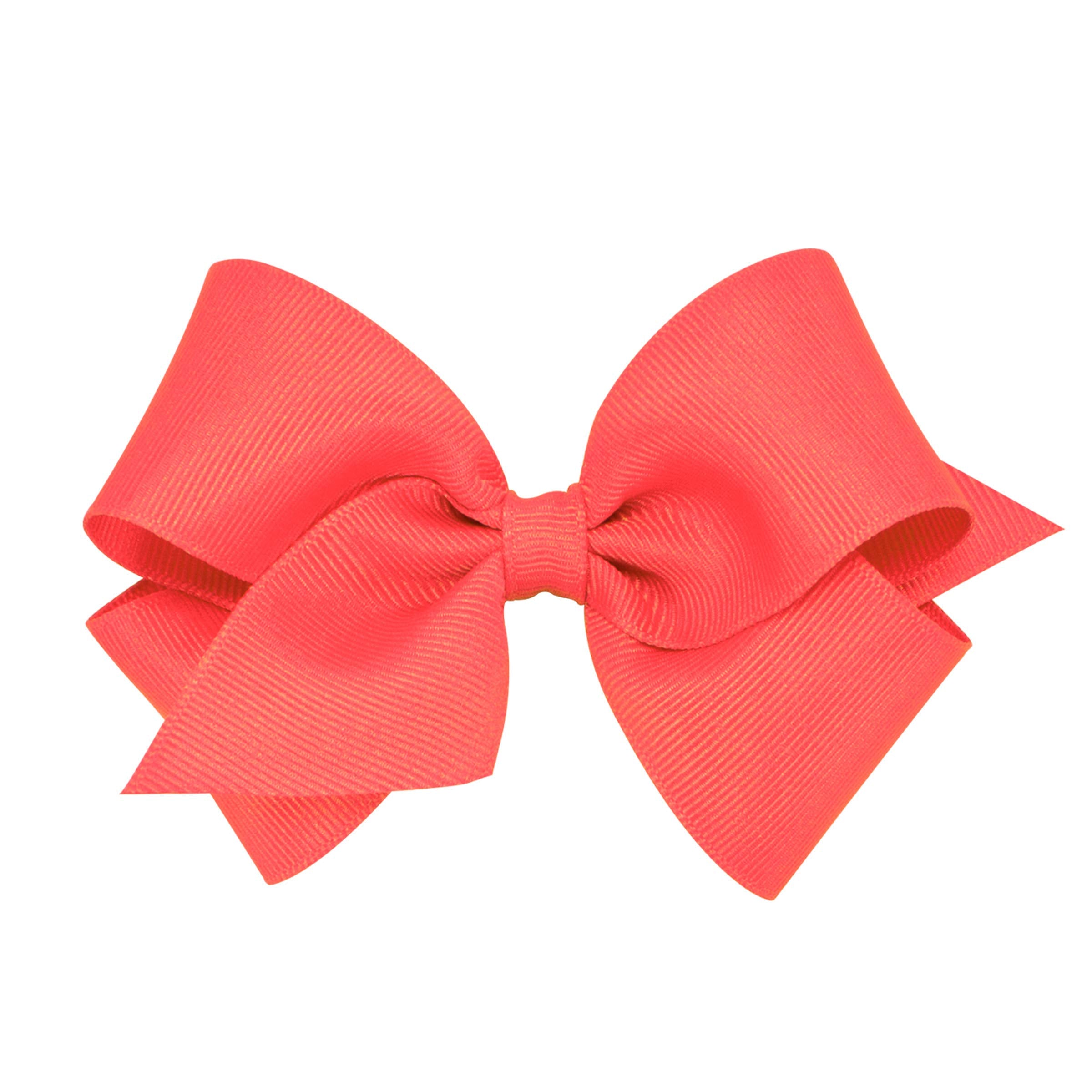 Wee Ones Watermelon bow closeup on WeeStay clip for secure all-day wear and chic color.