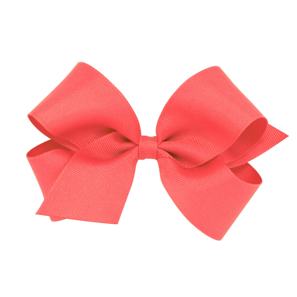 Wee Ones Watermelon bow closeup highlights sturdy WeeStay clip for secure all-day wear