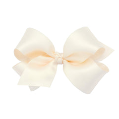 Wee Ones WeeStay bow on clip in ecru provides secure all-day wear for active kids.