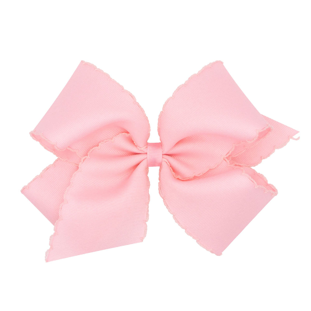 Wee Ones Moonstitch bow on WeeStay clip secures hairstyles with classic charm.
