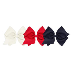 Wee Ones WeeStay No-Slip Clip closeup on solid grosgrain texture for secure daily wear.