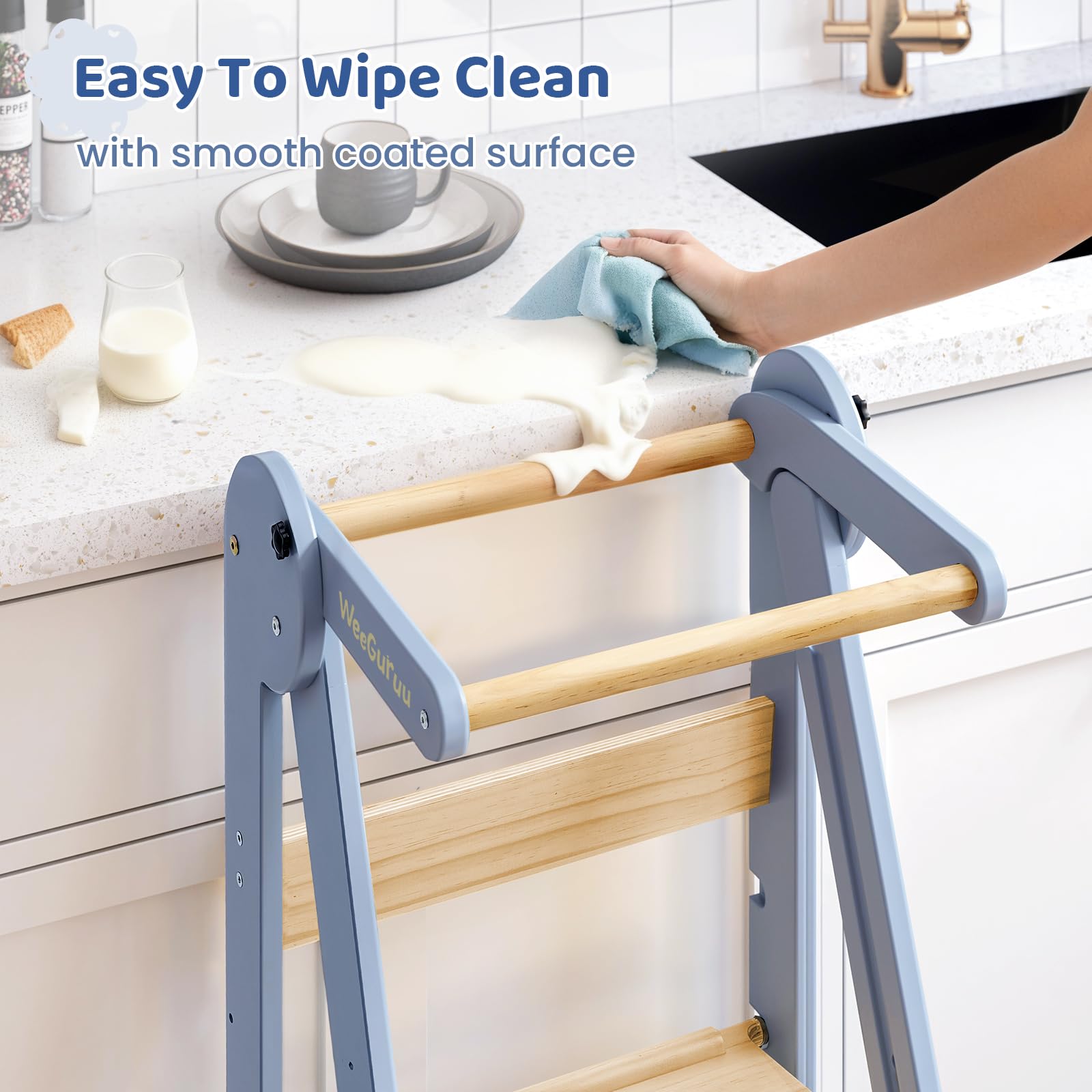 WeeGuruu foldable kitchen tower wide platform offers stable standing space for little helpers.