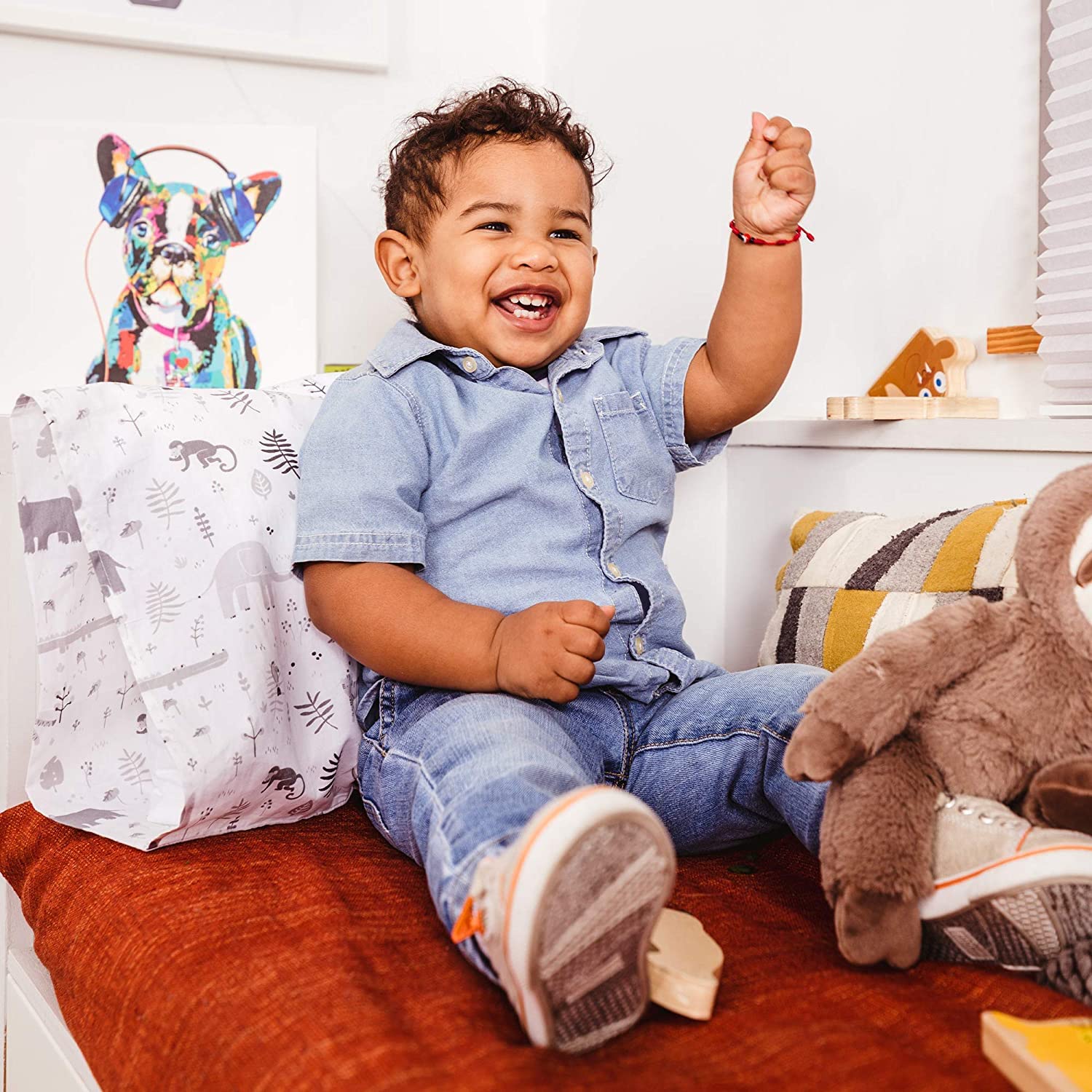 WeeSprout white pillow with safari print adds playful style to bedtime