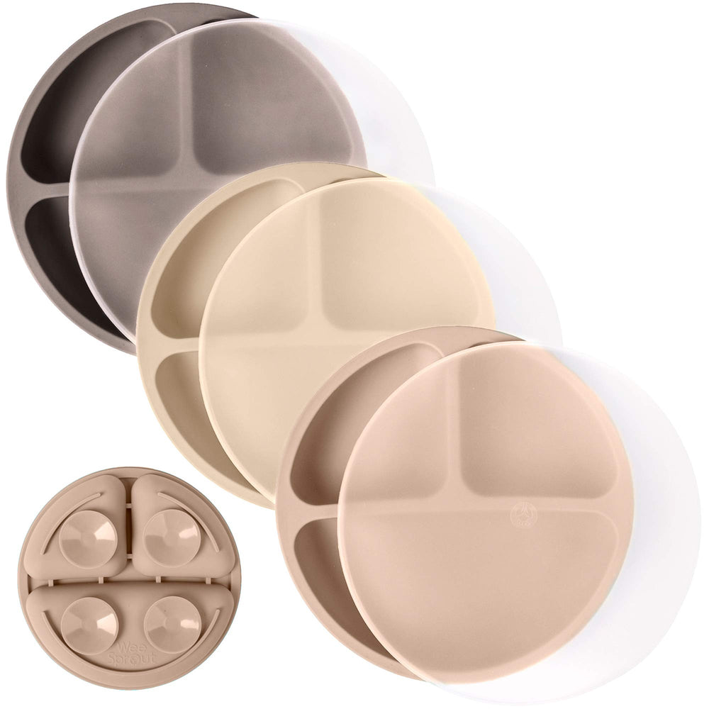 WeeSprout suction plates on a flat surface provide a secure grip to reduce spills.