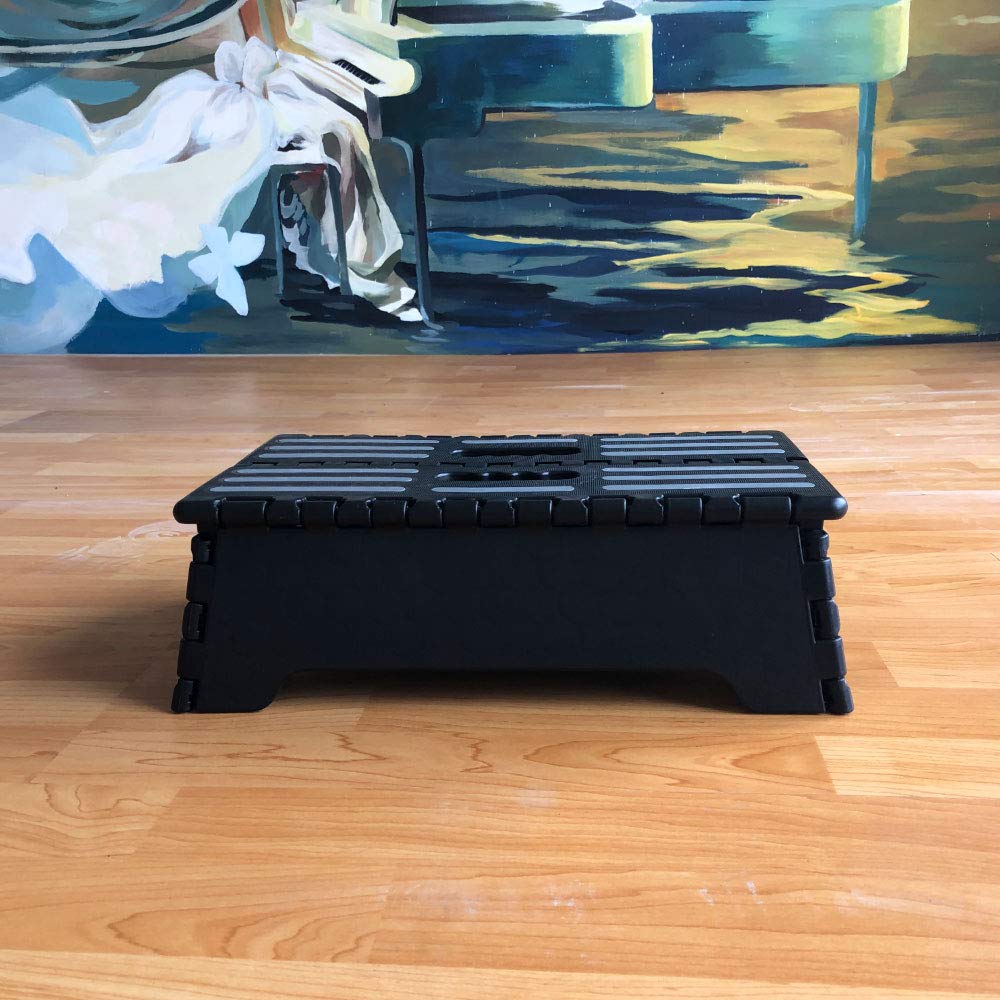 WeFaner 5-inch folding step lightweight plastic supports up to 300 pounds with a non-slip surface for stable footing.