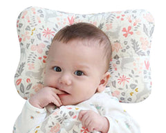 WelsLife soft hypoallergenic baby head and neck support with Bambi Pink cover in use for nap-time comfort.
