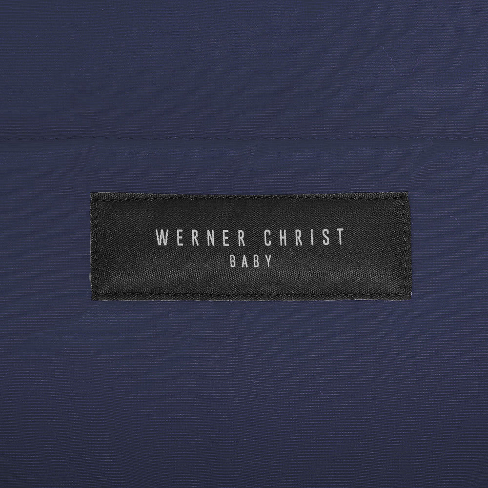 Werner Christ Flims Luxe water-repellent shell keeps outerwear dry.